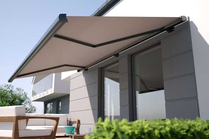 Beautiful residential awning enhances Matthews, NC residence.